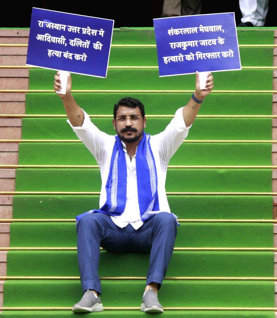 Azad Samaj MP Chandrashekhar Azad Ravan stages a protest at the ...