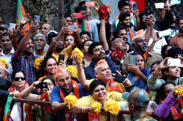 Bengaluru : Supporters of PM Narendra Modi during a roadshow