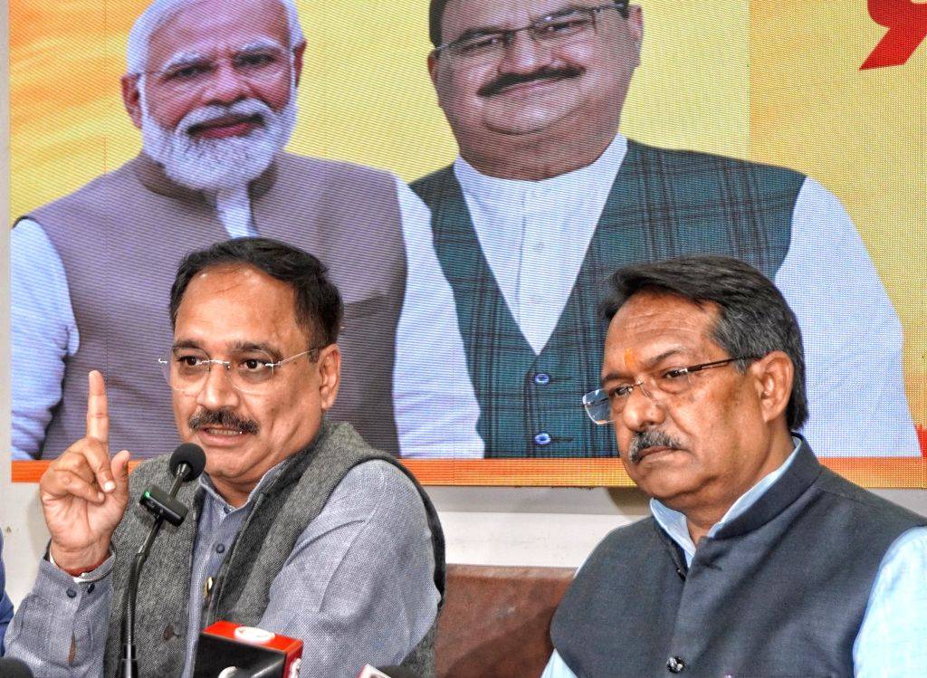 BJP Delhi President Virendra Sachdeva and MoS Harsh Malhotra address a ...