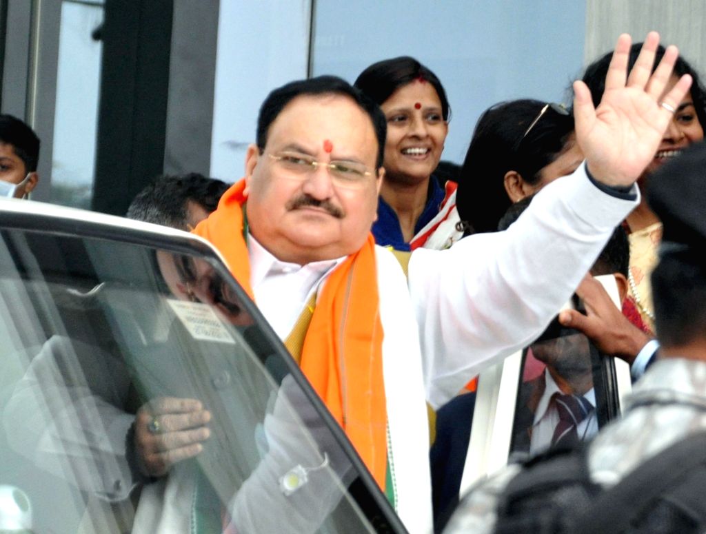 BJP national president J. P. Nadda waves to supporters
