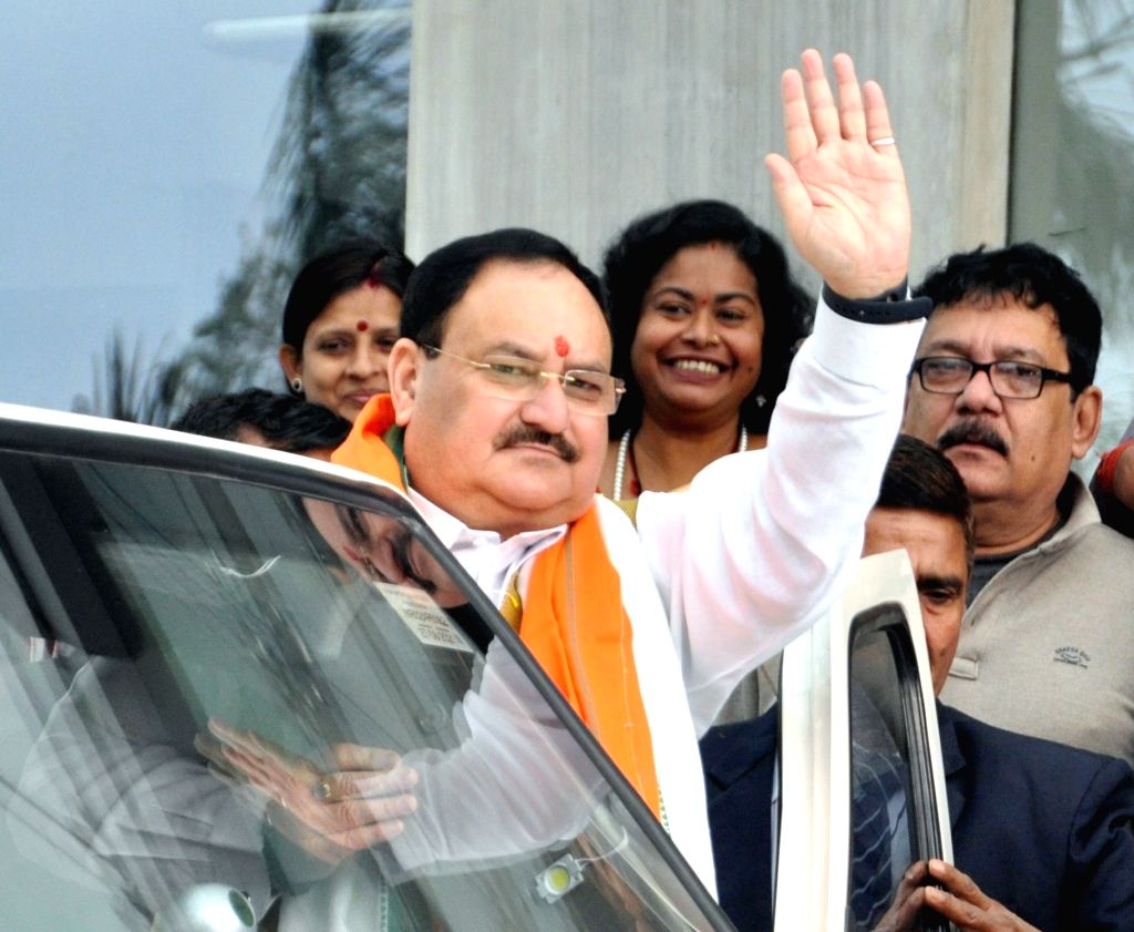 BJP national president J. P. Nadda waves to supporters