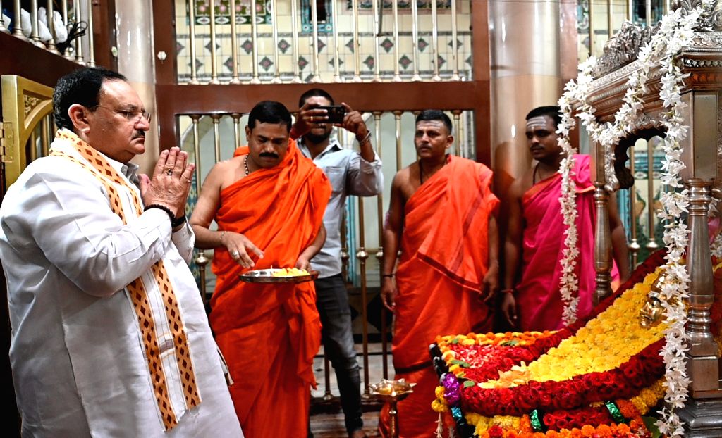 BJP National President JP Nadda offers prayer during their visit ...