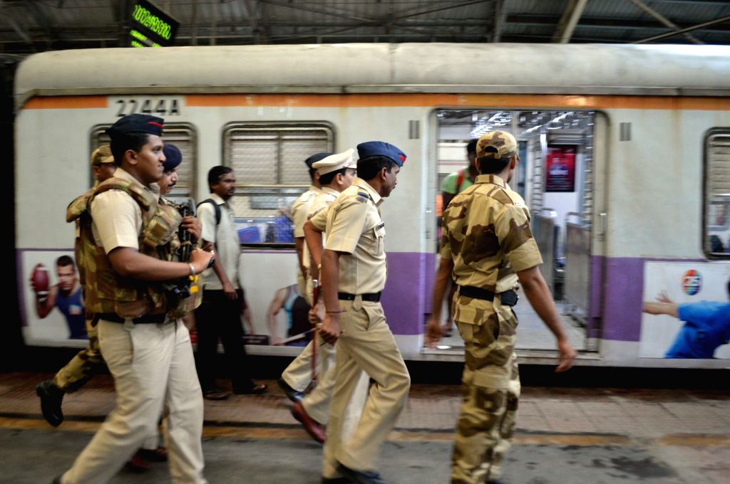 Bomb Detection and Disposal Squad (BDDS) men carry out security checks ...