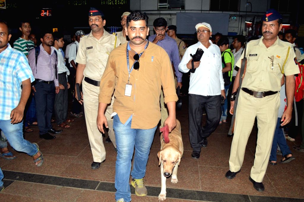 Bomb Detection and Disposal Squad (BDDS) men carry out security checks ...