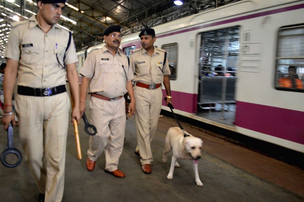 Bomb Detection and Disposal Squad (BDDS) men carry out security checks ...