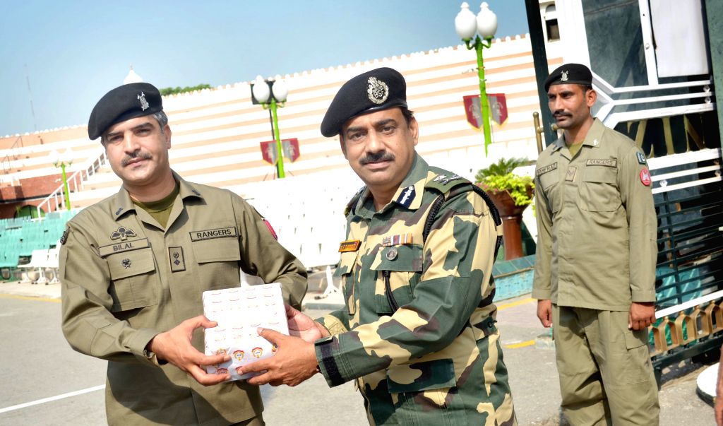 BSF-Pak Rangers exchange sweets on Id-ul-Zuha