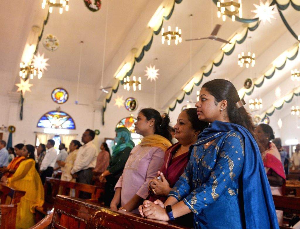 Christian devotees attend a prayer at St Patrick's Church on the ...