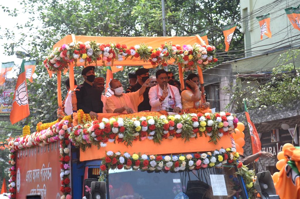 Chief Minister of Uttar Pradesh Yogi Adityanath at a roadshow ahead of ...
