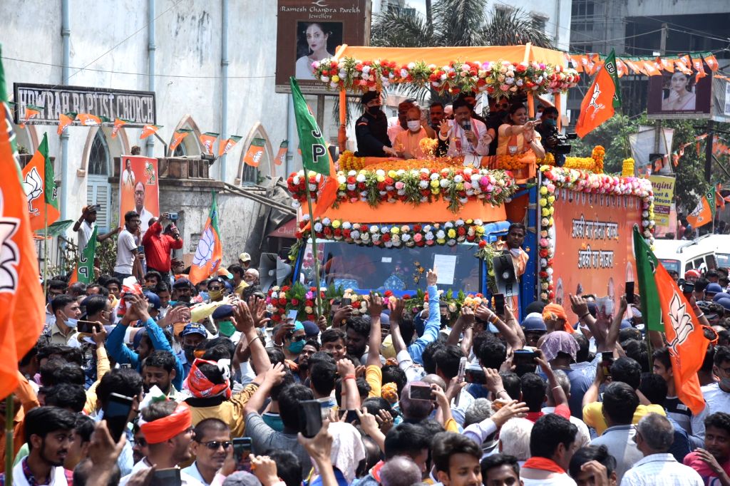 Chief Minister of Uttar Pradesh Yogi Adityanath at a roadshow ahead of ...
