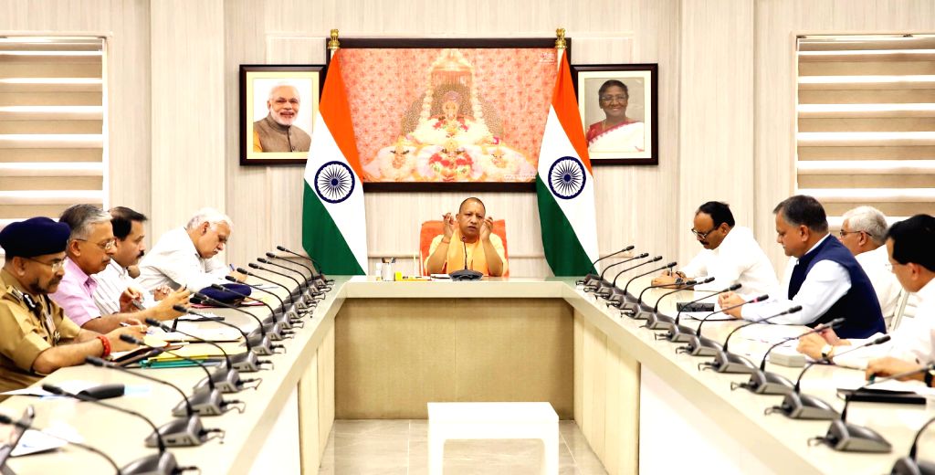 Chief Minister Yogi Adityanath chairs a meeting to review the current ...