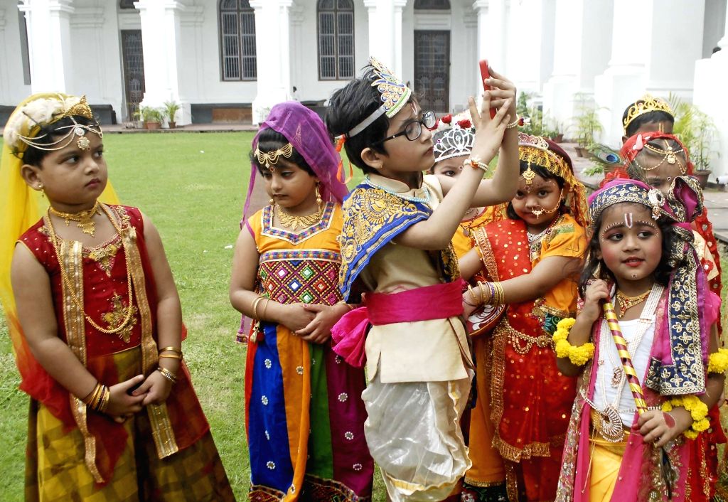 Children dressed as Hindu deity Krishna and Radha during 'Janmashtami ...