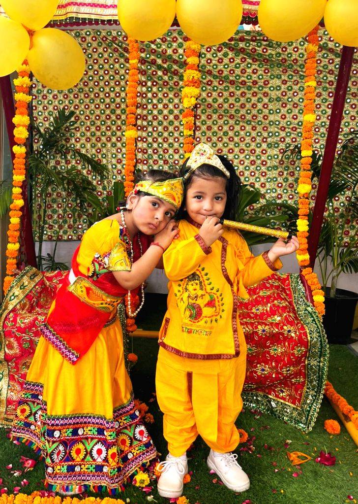 Children dressed as Lord Krishna and Radha on the occassion of the ...