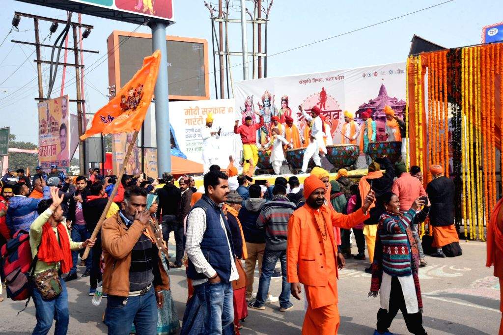 Devotees arrive ahead of the consecration ceremony of Ram Mandir