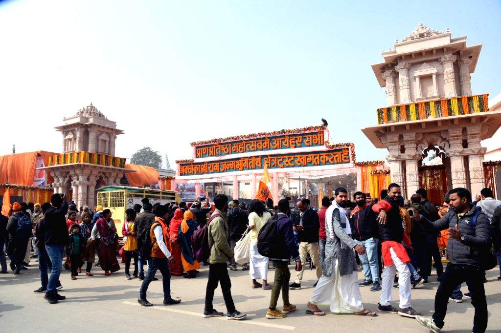 Devotees arrive ahead of the consecration ceremony of Ram Mandir