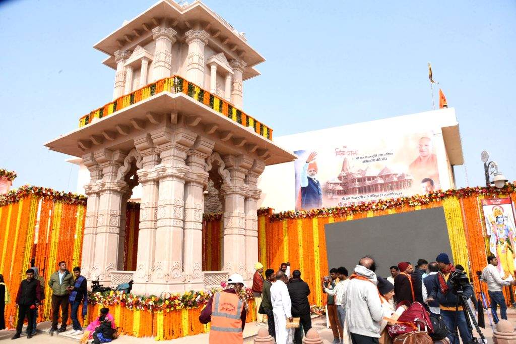 Devotees arrive ahead of the consecration ceremony of Ram Mandir