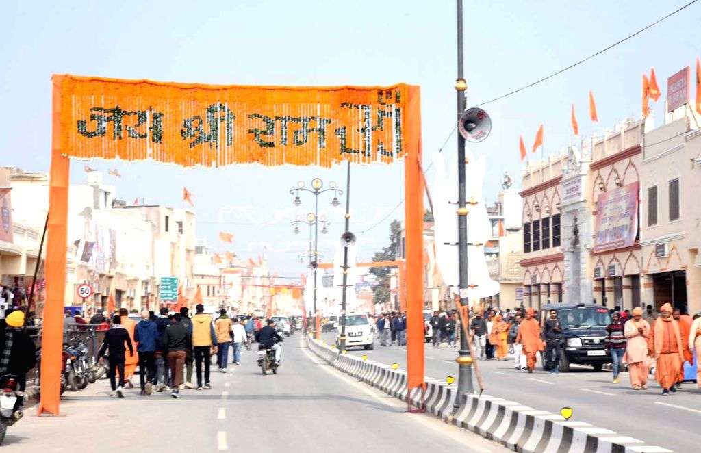 Devotees arrive ahead of the consecration ceremony of Ram Mandir