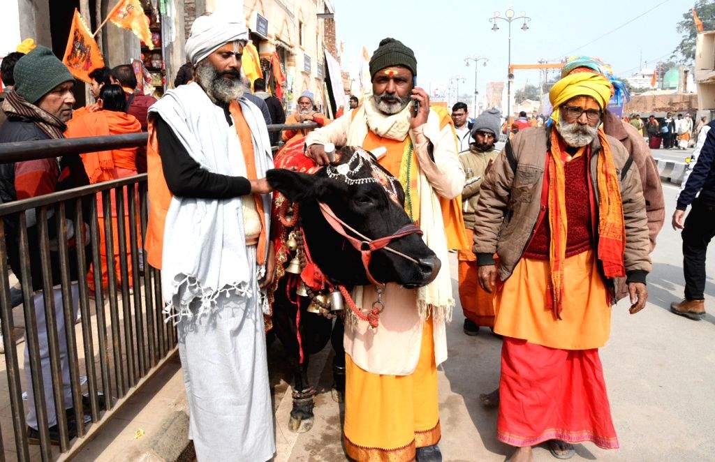 Devotees arrive ahead of the consecration ceremony of Ram Mandir