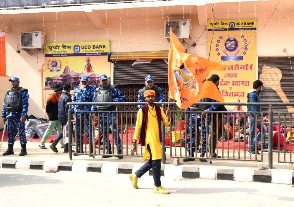 Devotees arrive ahead of the consecration ceremony of Ram Mandir