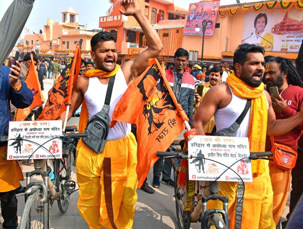 Devotees chant slogans ahead of the Ram temple consecration ceremony
