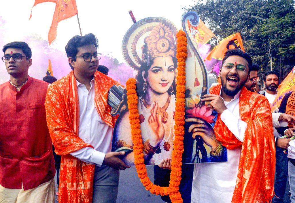 Devotees participate in a religious procession ahead of Shri Ram ...