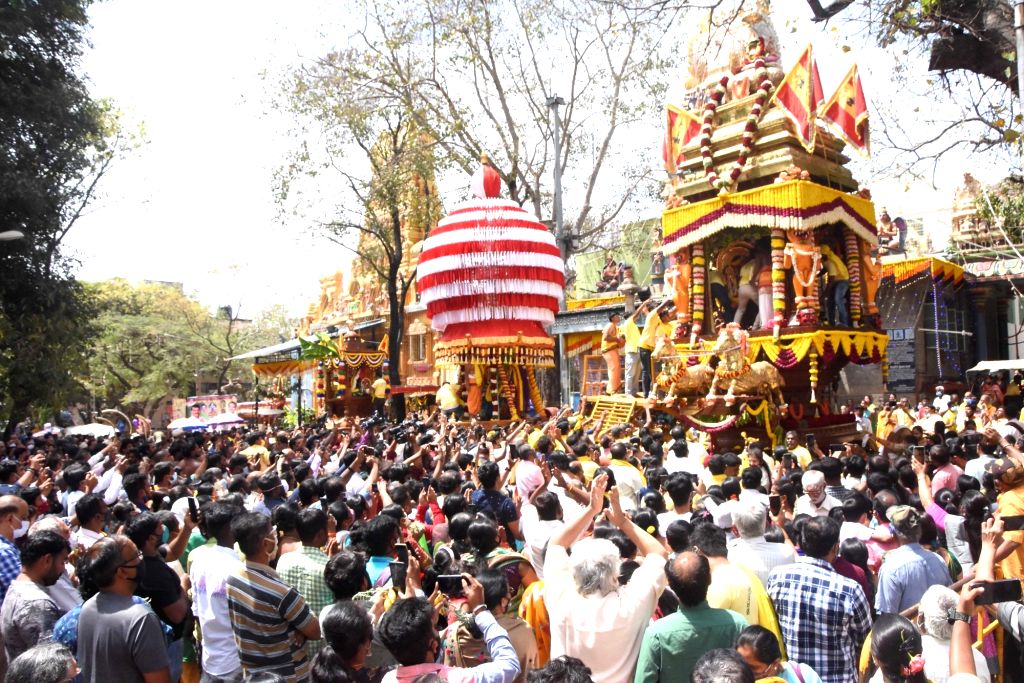 Devotees pay their obeisance while participating in 'Brahma Rathotsava