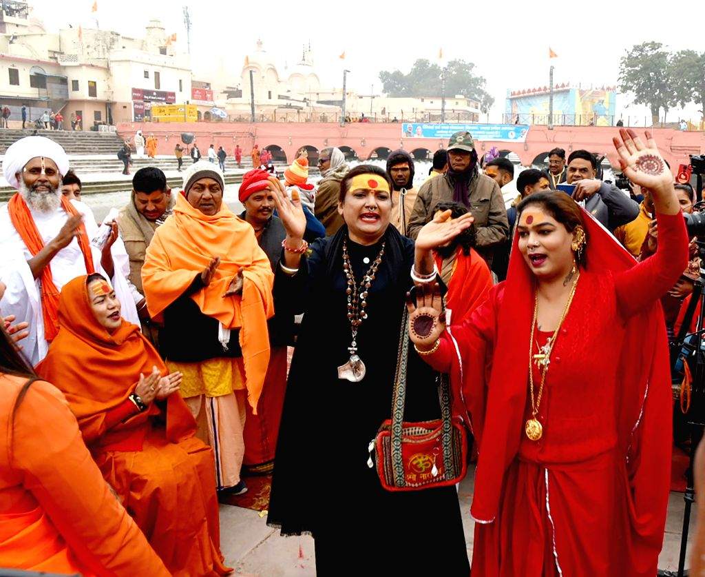 Devotees sing religious songs ahead of the Ram temple consecration ceremony