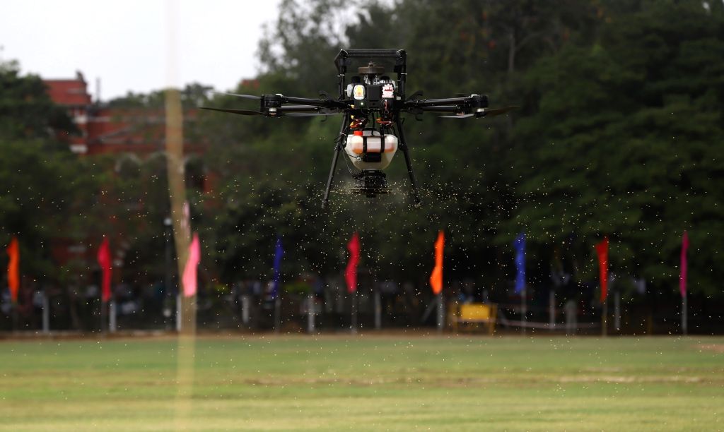 Drones hover during the Tamil Nadu Unmanned Aerial Vehicles Corporation