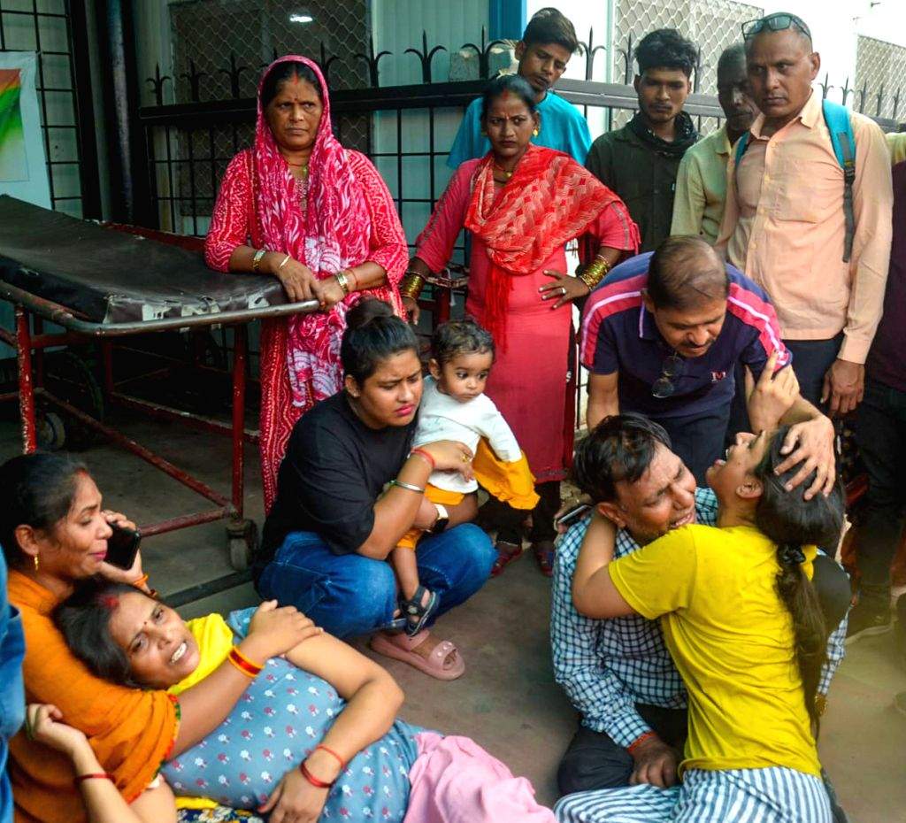 Family members mourn the loss of five individuals , who died in a(02)