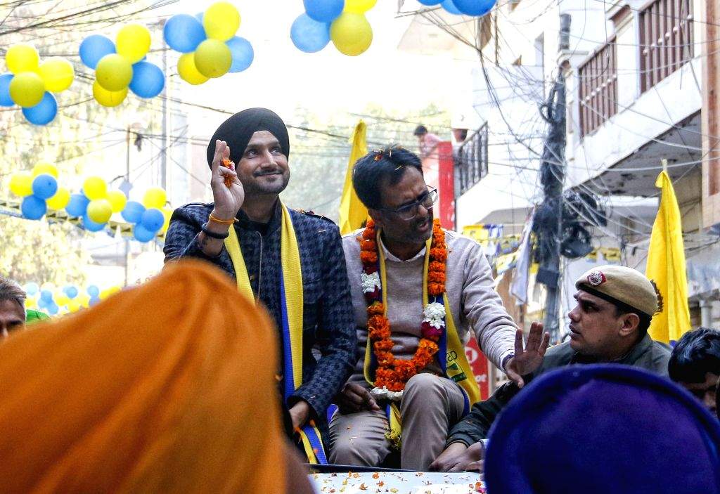 Former Indian cricketer and AAP Rajya Sabha MP Harbhajan Singh leads a ...