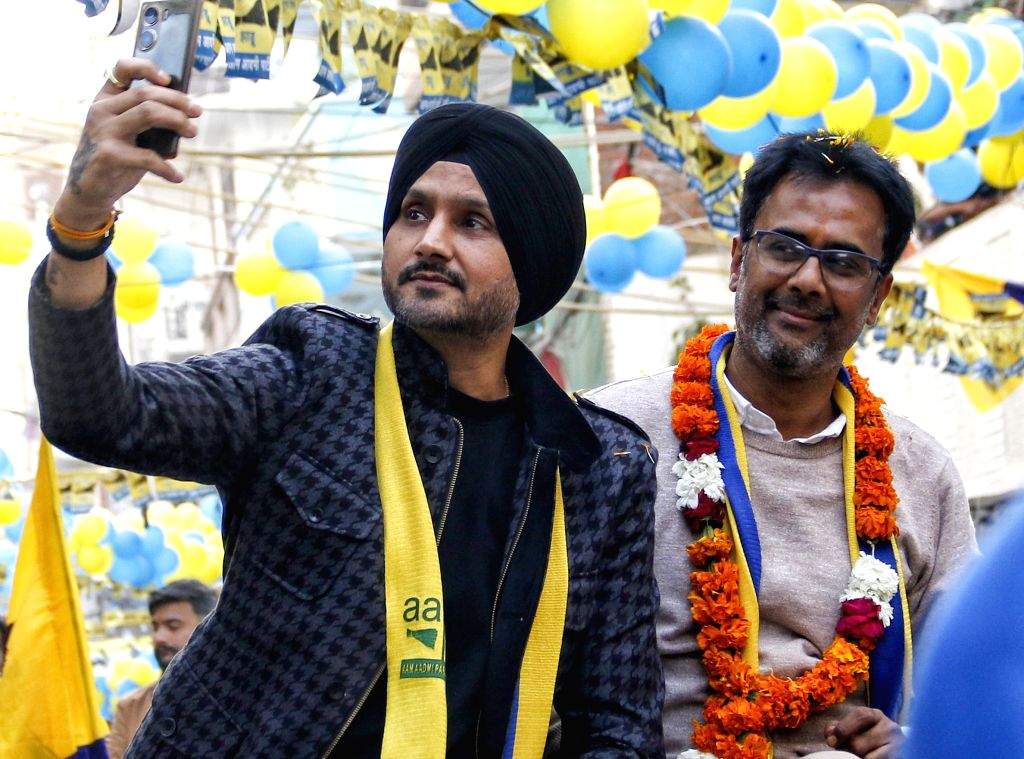 Former Indian cricketer and AAP Rajya Sabha MP Harbhajan Singh leads a ...