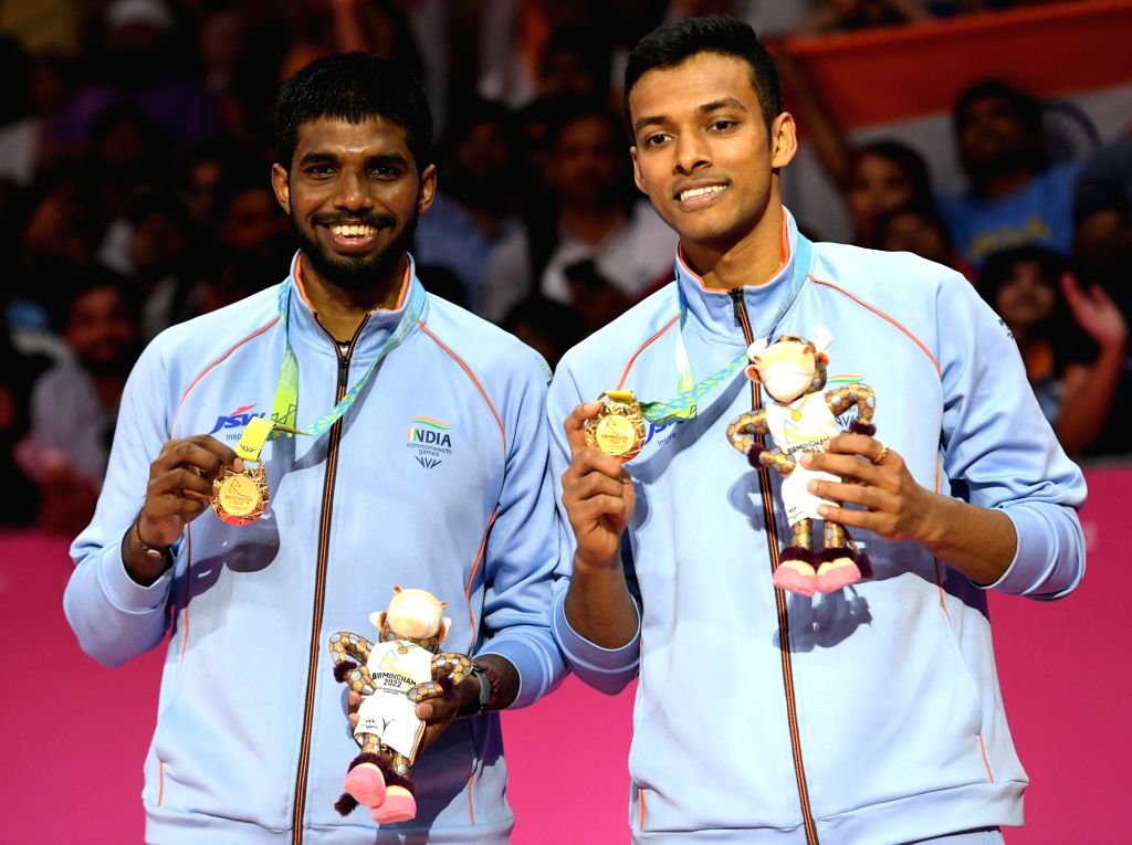 Gold Medalists Satwiksairaj Rankireddy and Chirag Shetty pose with ...