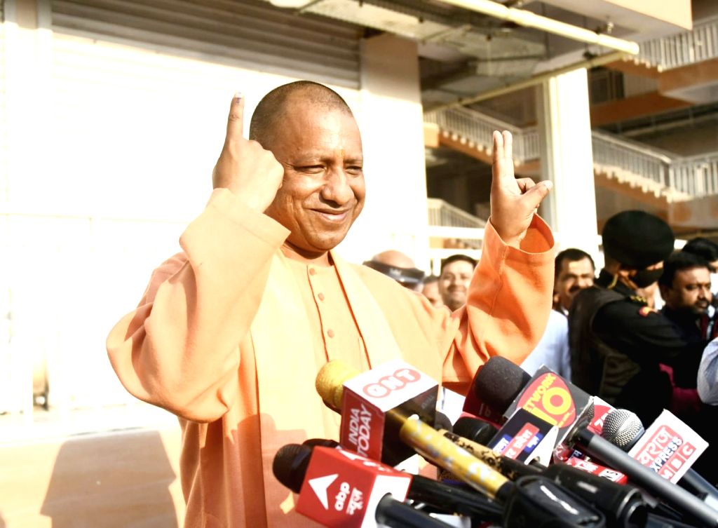 :Gorakhpur : Uttar Pradesh Chief Minister Yogi Adityanath casts his ...