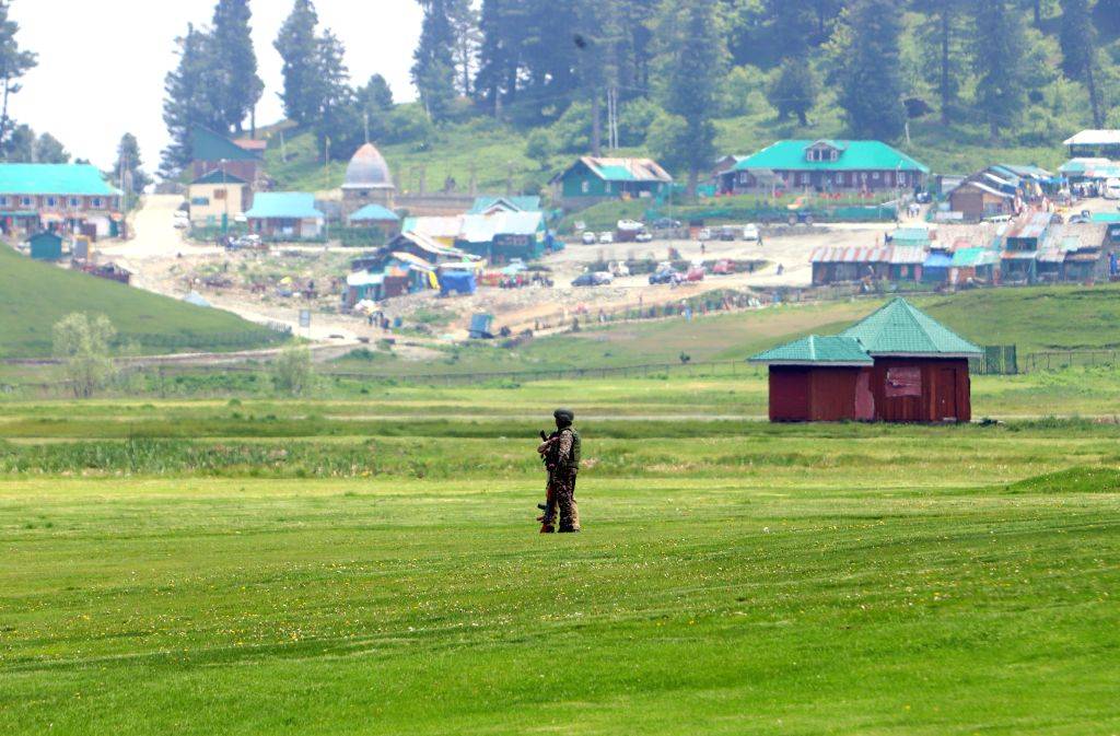 Security personnel stand guard upon CM's arrival