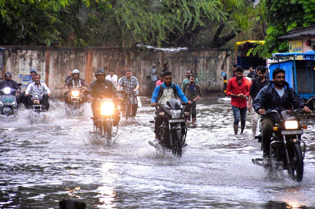Heavy rain lashes the city