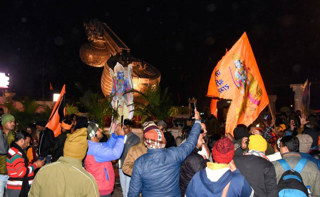 Hindu devotees chant slogans ahead of the consecration ceremony of Ram ...