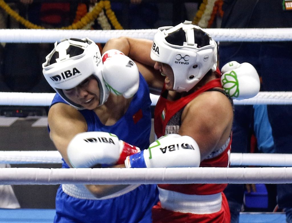 New Delhi : India's Saweety Boora and China's Wang Lina during the ...