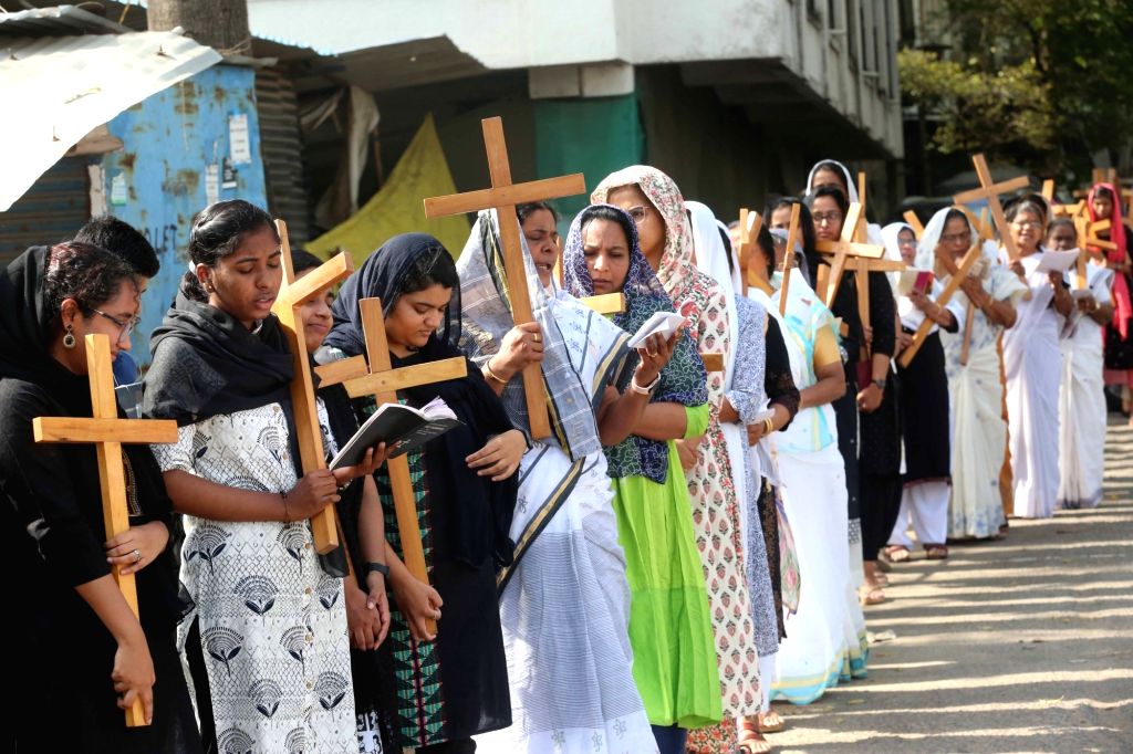 : Bhopal: Indian Christian devotees take part in a religious procession ...