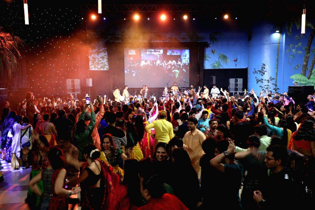 Indian community people during the 'Garba Night' held in Paris when the ...