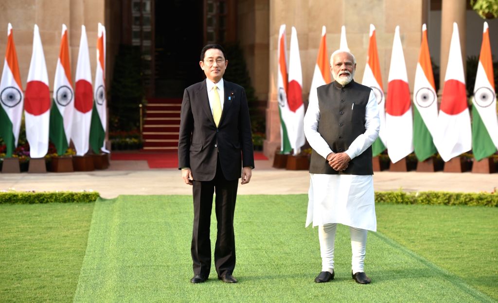 Japanese Prime Minister Fumio Kishida and Narendra Modi greet each ...