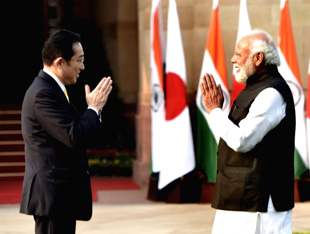Japanese Prime Minister Fumio Kishida and Narendra Modi greet each ...