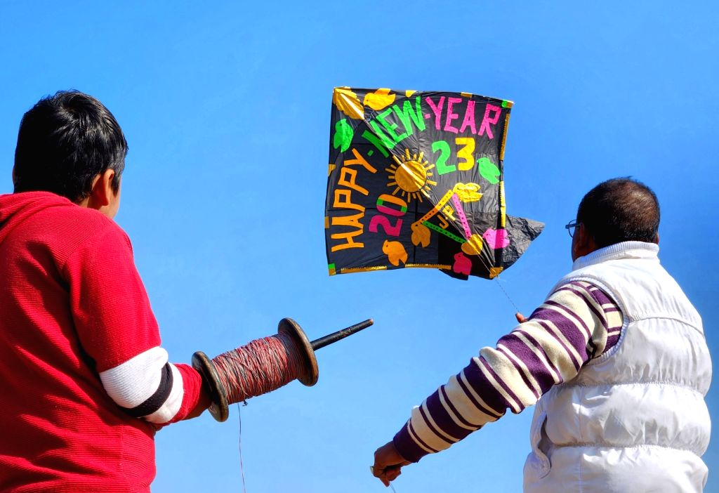 Amritsar : Kite-maker Jagmohan Kanojia flies a special kite on the eve ...