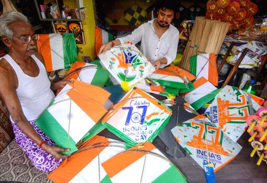 Kolkata : A kite maker prepares kites at his workshop ahead of the 78th ...