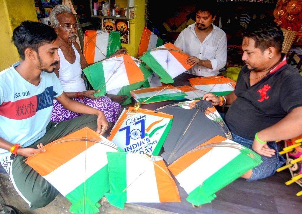 Kolkata : A kite maker prepares kites at his workshop ahead of the 78th ...