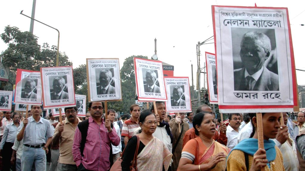 Leftist Activists Leftist activists take part in a rally paying tribute to Nelson Mandela