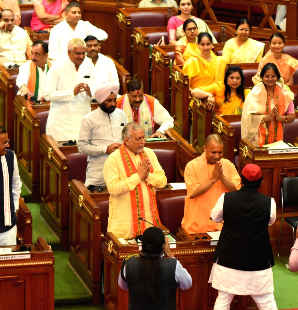 : Lucknow :Uttar Pradesh Chief Minister Yogi Adityanath and leder of ...
