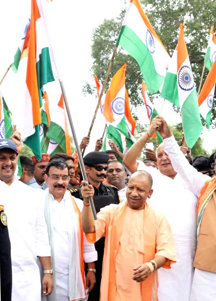 Lucknow : Uttar Pradesh Chief Minister Yogi Adityanath takes part in a ...