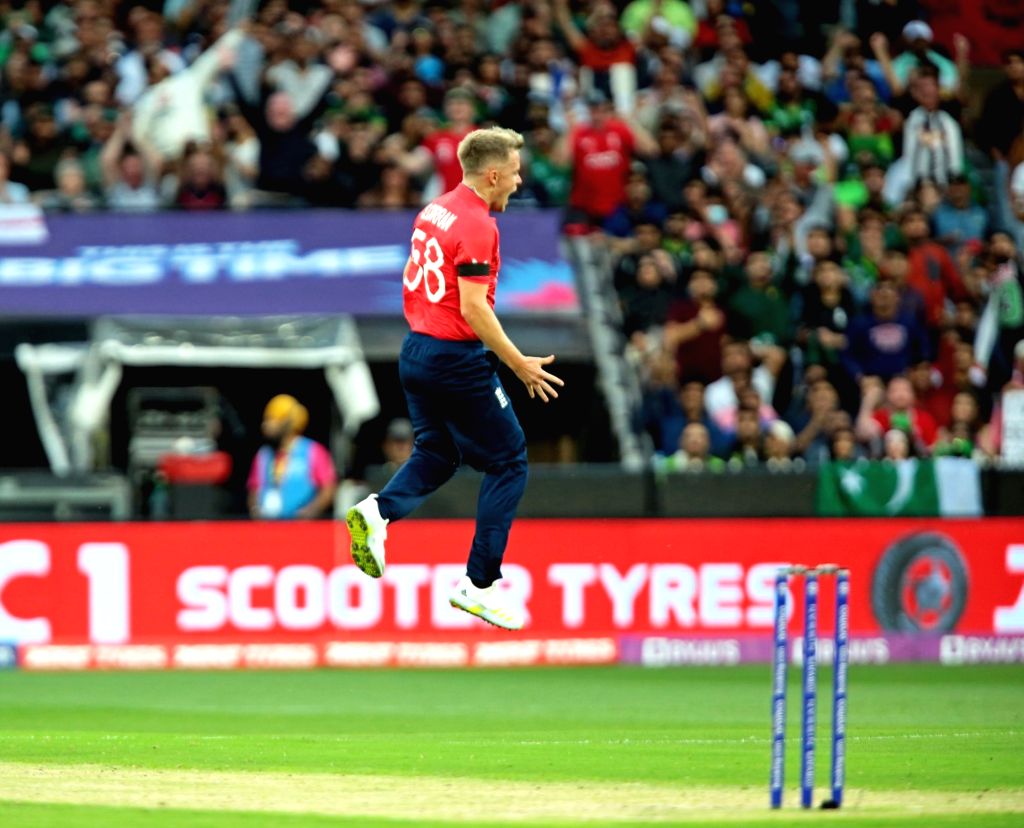 Melbourne : England's Sam Curran celebrates after taking Mohammad ...