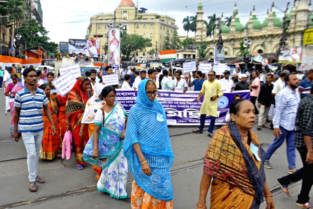 Members of State Minority Commission Forum take part in a protest rally ...