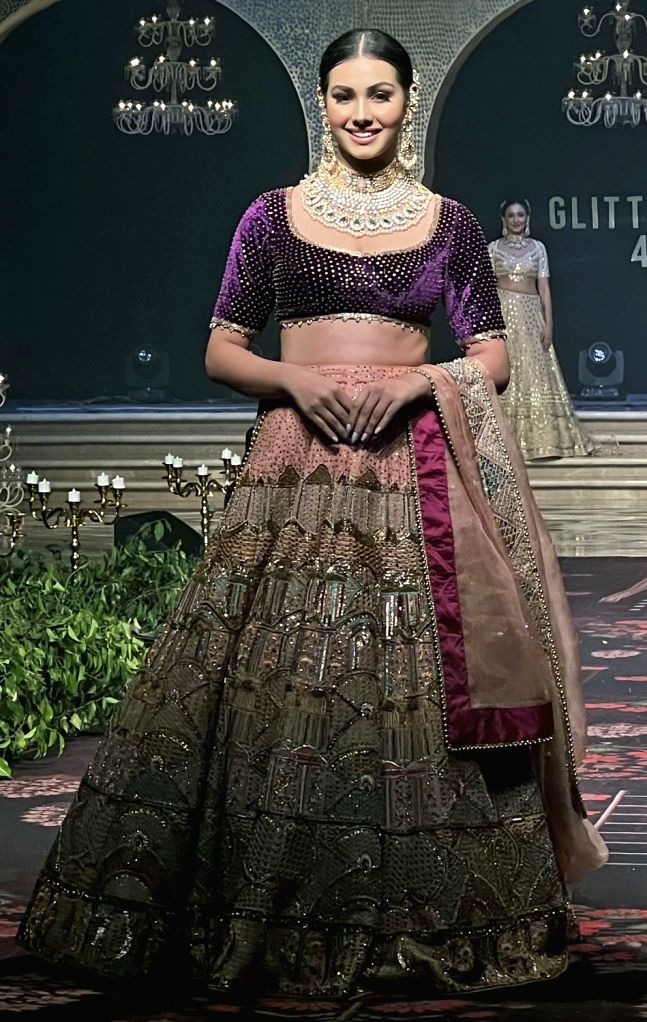 Famous Female Ramp Model Model walks the ramp during a fashion show organised by women wing of FICCI