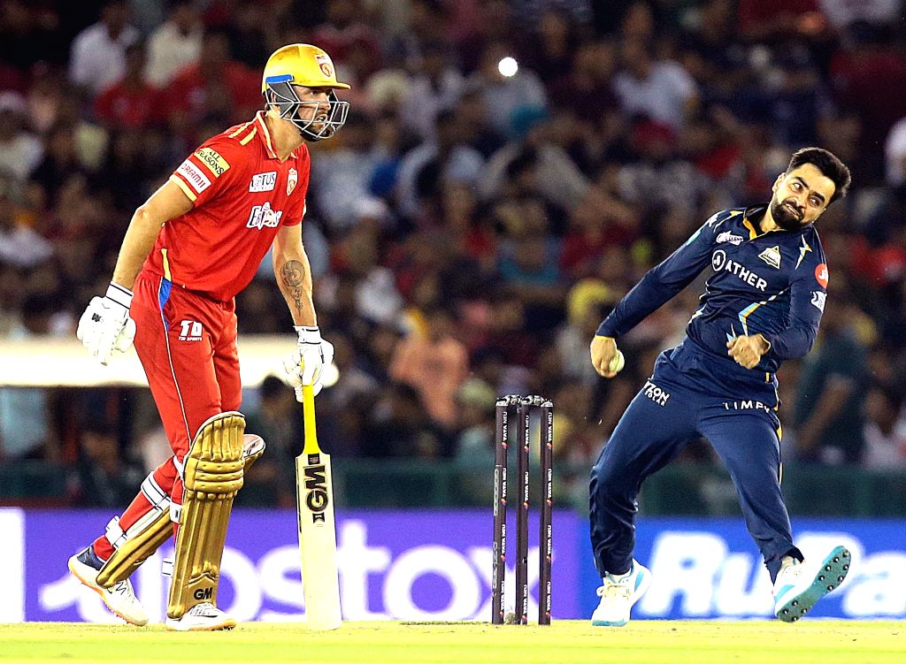Mohali : PBKS' Matt Short and GT's Rashid Khan during the match